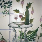 Hand painted mural of table with wine and glasses in garden